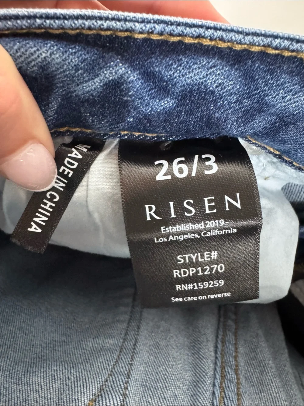 Risen Distressed High Rise Jeans